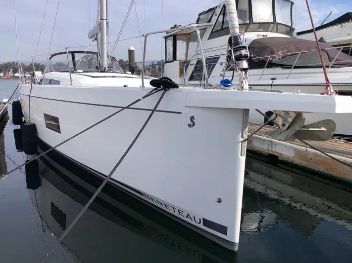 Hydrobaby3 Yacht Photos Pics 2019 Beneteau Oceanis 51.1 yacht docked at marina, sleek white design.