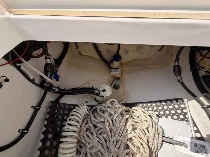  Yacht Photos Pics Interior of a 2022 Regulator 28 boat with ropes and hoses.