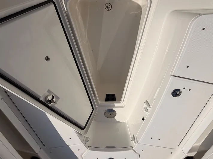  Yacht Photos Pics Interior view of a 2022 Regulator 28 boat storage compartment.