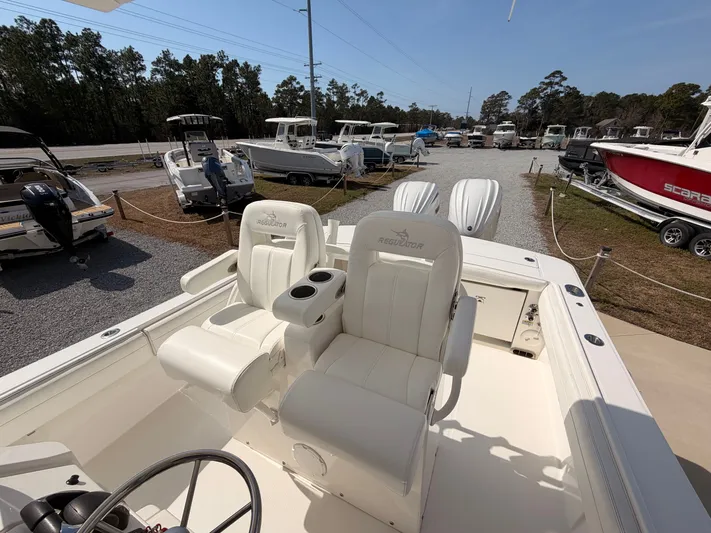  Yacht Photos Pics 2022 Regulator 28 boat with luxurious outdoor seating.