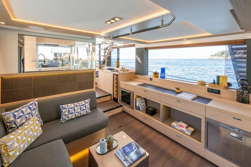  Yacht Photos Pics Luxurious interior of 2025 Beneteau Swift Trawler 54 with ocean view and modern amenities.