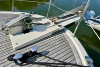 Anchor system on 1990 Trader 41 + 2 Sundeck yacht, featuring deck and cleats.