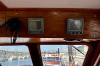 Interior view of 1990 Trader 41 + 2 Sundeck boat with navigation equipment.