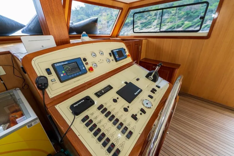  Yacht Photos Pics Control panel of a 2022 Gulet 24 m yacht, featuring navigation equipment.