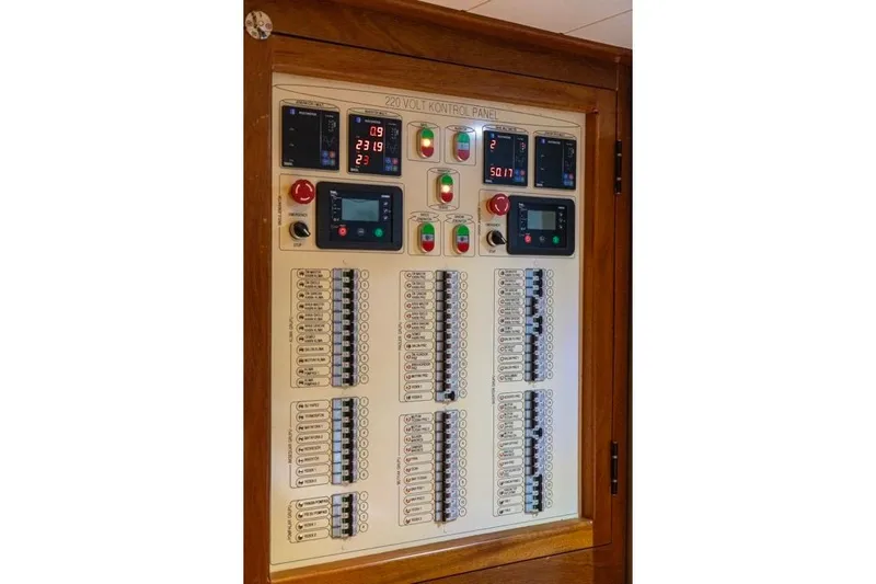  Yacht Photos Pics Electrical control panel on a 2022 Gulet 24 m yacht, featuring switches and displays.