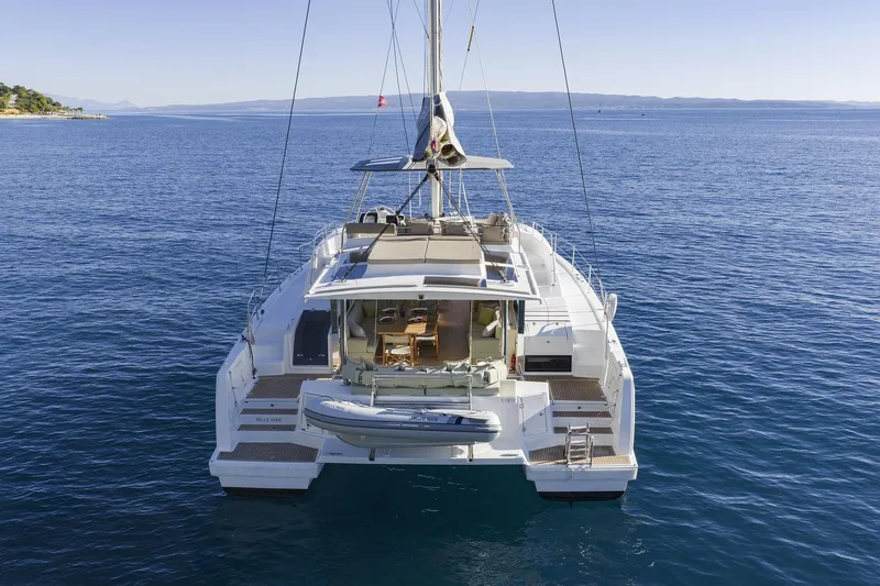 Belle Amie Yacht Photos Pics 2025 Bali 4.6 catamaran on serene ocean waters, showcasing luxury and modern design.