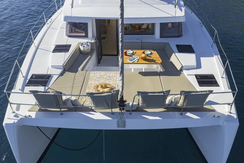 Belle Amie Yacht Photos Pics Luxurious 2025 Bali 4.6 catamaran with spacious deck and elegant seating arrangement.