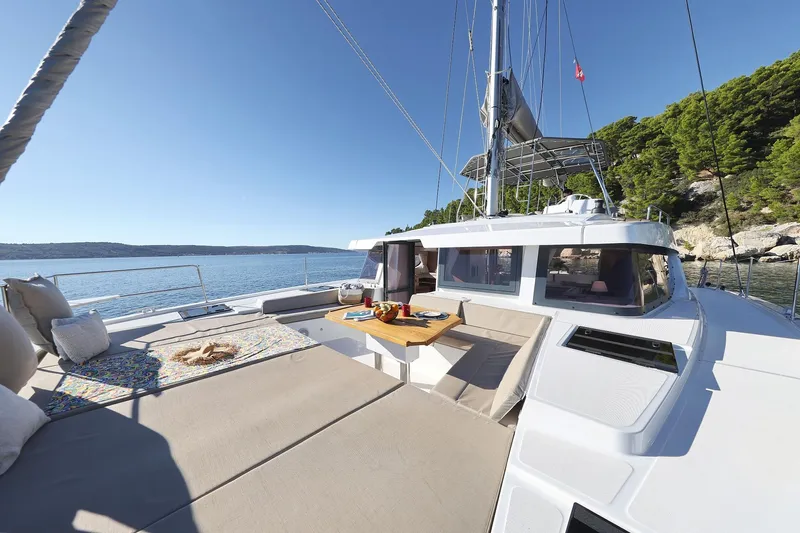 Belle Amie Yacht Photos Pics Luxurious 2025 Bali 4.6 yacht with spacious deck, scenic ocean view, and comfortable seating.