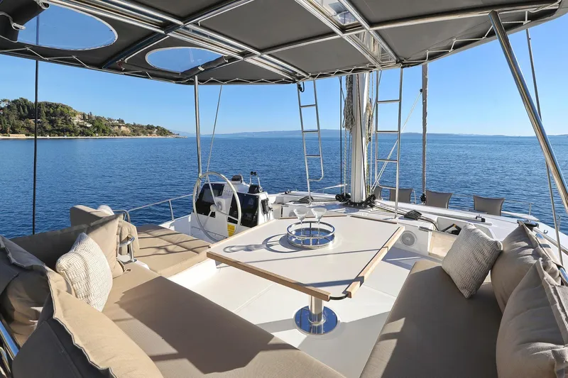 Belle Amie Yacht Photos Pics Luxurious Bali 4.6 yacht interior, 2025 model, with ocean view and comfortable seating.