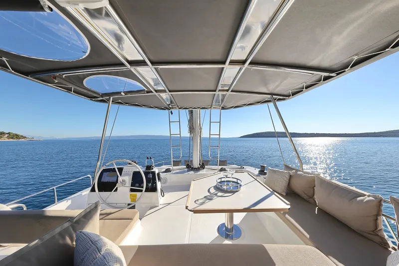 Belle Amie Yacht Photos Pics Luxurious Bali 4.6 yacht interior, 2025 model, with ocean view and comfortable seating.