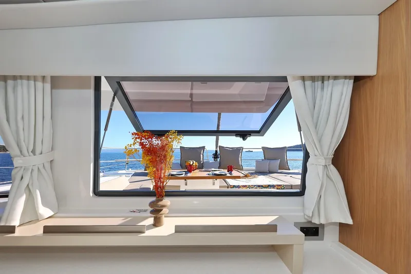 Belle Amie Yacht Photos Pics Luxurious Bali 4.6 yacht interior with ocean view, elegant decor, and modern design, 2025 model.