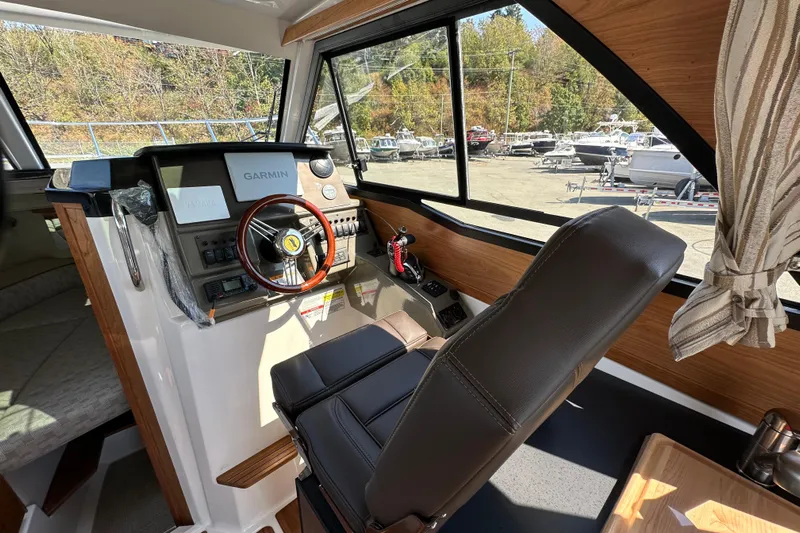  Yacht Photos Pics Interior of 2026 Cutwater C-248 Coupe boat with modern helm and navigation system.