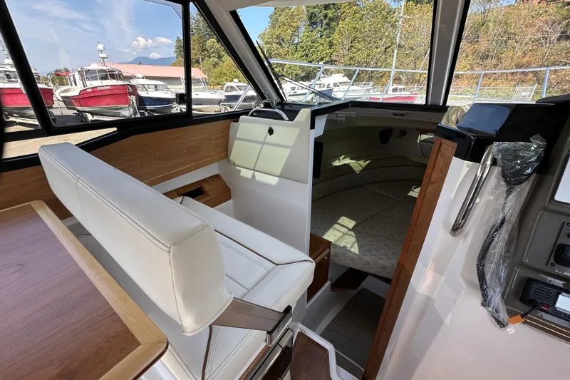  Yacht Photos Pics Interior of 2026 Cutwater C-248 Coupe boat with seating and cabin view.