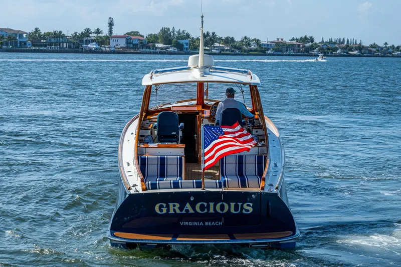 Gracious Yacht Photos Pics Hinckley Picnic Boat 37 MKIII cruising with American flag, Virginia Beach, 2018 model.