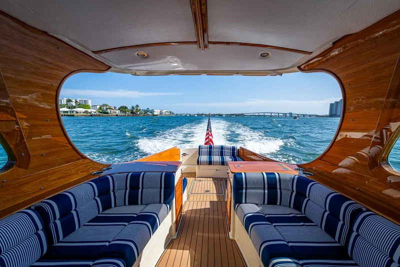 Gracious Yacht Photos Pics 2018 Hinckley Picnic Boat 37 MKIII cruising with elegant interior and scenic ocean view.