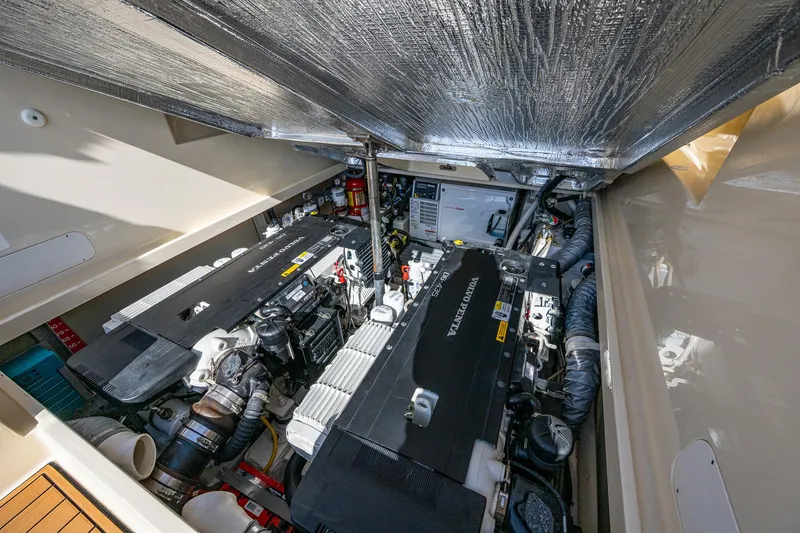 Gracious Yacht Photos Pics Engine room of 2018 Hinckley Picnic Boat 37 MKIII, showcasing dual engines and mechanical components.