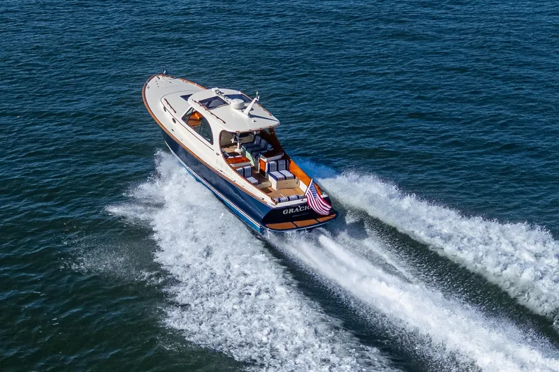 Gracious Yacht Photos Pics Hinckley Picnic Boat 37 MKIII cruising on open water, 2018 model.