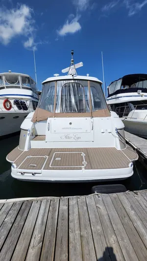  Yacht Photos Pics 2008 Cruisers Yachts 420 Express docked, showcasing sleek design and spacious deck.