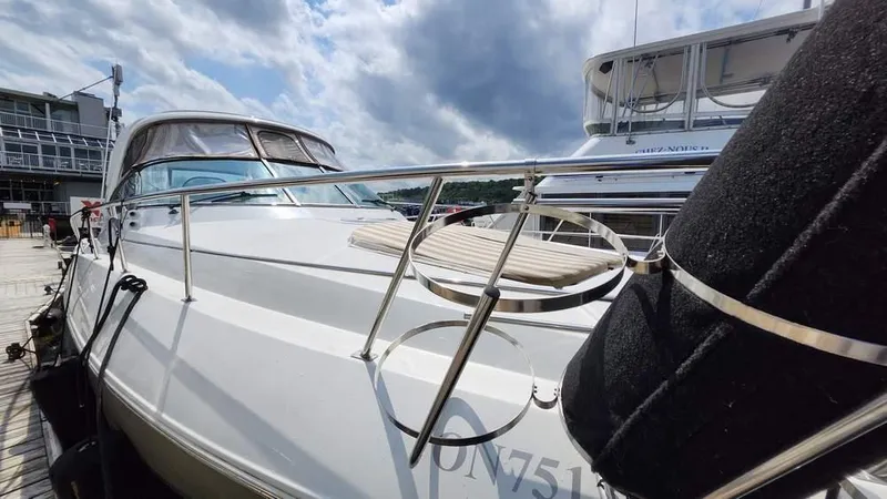  Yacht Photos Pics 2008 Cruisers Yachts 420 Express docked under a cloudy sky.