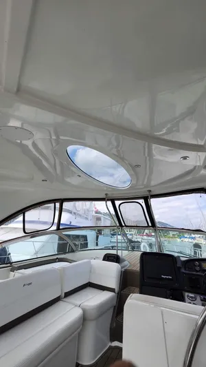  Yacht Photos Pics Interior of 2008 Cruisers Yachts 420 Express with white seating and panoramic windows.