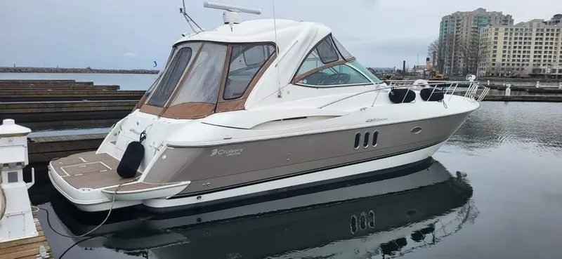  Yacht Photos Pics 2008 Cruisers Yachts 420 Express docked in a marina, featuring sleek design and modern amenities.