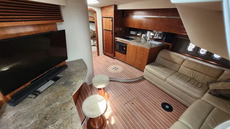  Yacht Photos Pics Luxurious 2008 Cruisers Yachts 420 Express interior with kitchen, seating, and entertainment area.