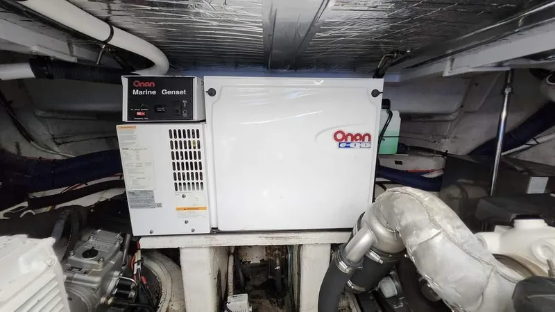 Yacht Photos Pics Engine room of 2008 Cruisers Yachts 420 Express with Onan marine generator.