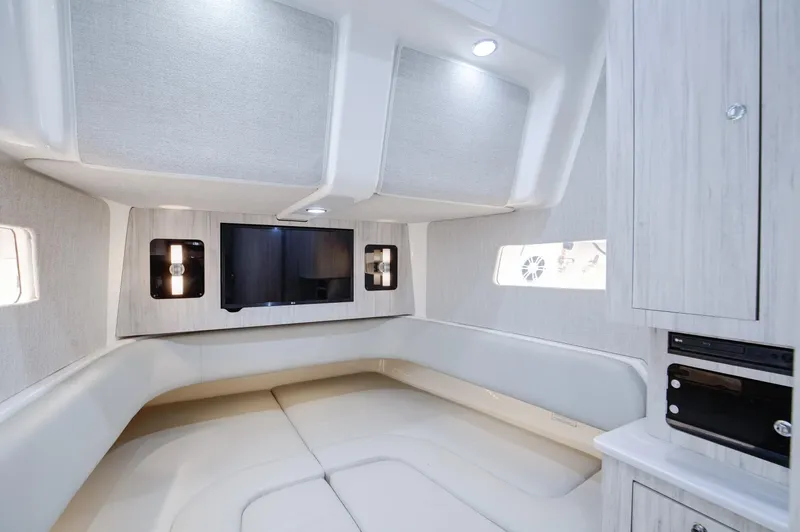  Yacht Photos Pics Luxurious interior of 2021 Regulator 41 boat with modern amenities and sleek design.