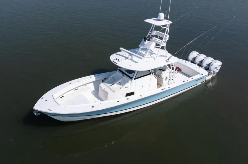  Yacht Photos Pics 2021 Regulator 41 boat with four engines on calm water.