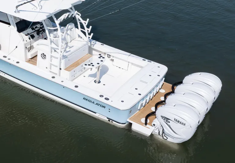  Yacht Photos Pics 2021 Regulator 41 boat with Yamaha engines on calm water.