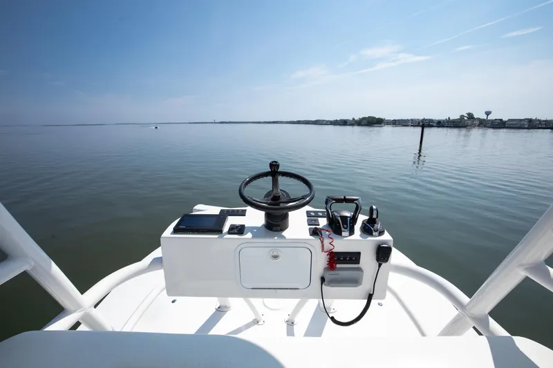  Yacht Photos Pics Helm of 2021 Regulator 41 boat with calm water view.