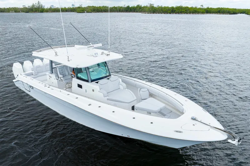  Yacht Photos Pics 2026 HCB 42 Lujo luxury boat on calm water, featuring sleek design and spacious deck.