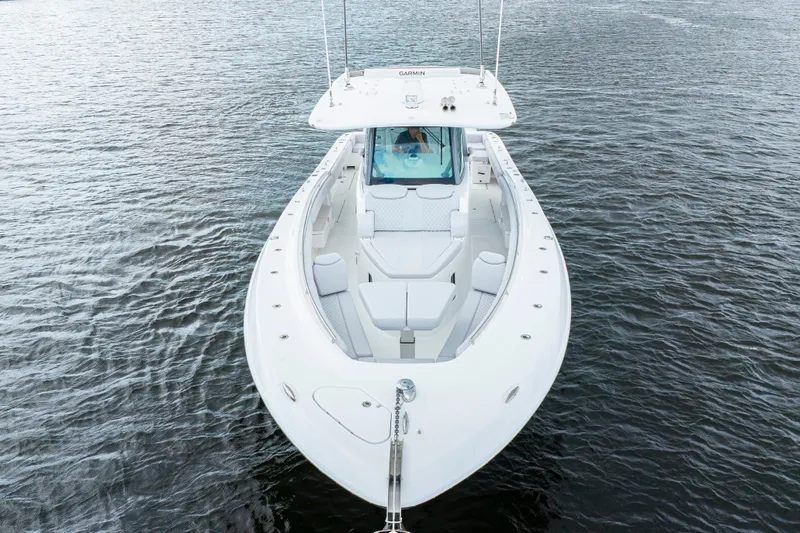  Yacht Photos Pics 2026 HCB 42 Lujo boat on calm water, aerial view.