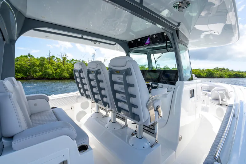  Yacht Photos Pics 2026 HCB 42 Lujo boat interior with modern seating and navigation controls.