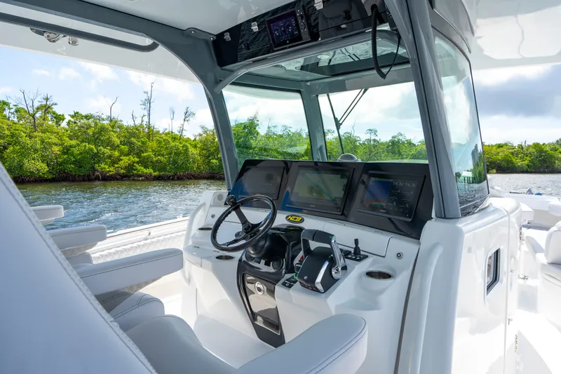  Yacht Photos Pics 2026 HCB 42 Lujo boat cockpit with advanced navigation systems and sleek design.