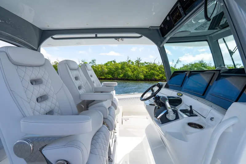  Yacht Photos Pics Luxurious interior of 2026 HCB 42 Lujo boat with plush seating and advanced navigation.