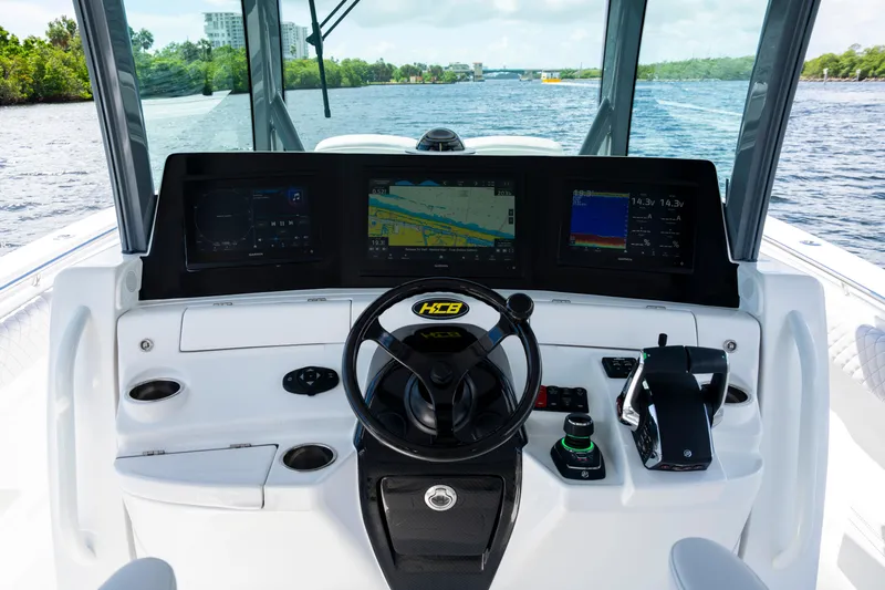  Yacht Photos Pics Helm of 2026 HCB 42 Lujo boat with advanced navigation displays and controls.