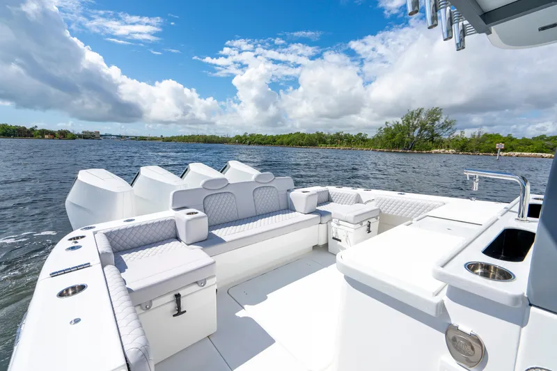  Yacht Photos Pics 2026 HCB 42 Lujo luxury boat interior with seating, on a sunny day by the water.