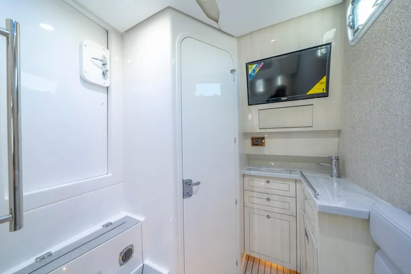  Yacht Photos Pics Luxurious bathroom interior of 2026 HCB 42 Lujo yacht with modern amenities.