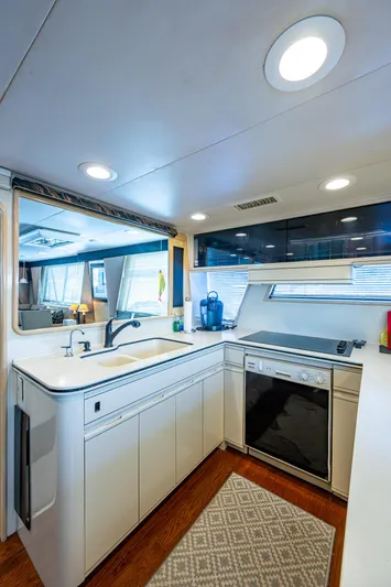 Mi Jule Yacht Photos Pics 1991 Viking 65 Motor Yacht kitchen with modern appliances and sleek design.