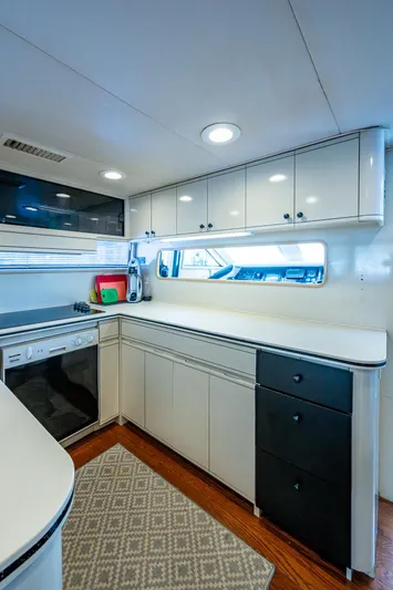 Mi Jule Yacht Photos Pics 1991 Viking 65 Motor Yacht kitchen with modern appliances and sleek cabinetry.