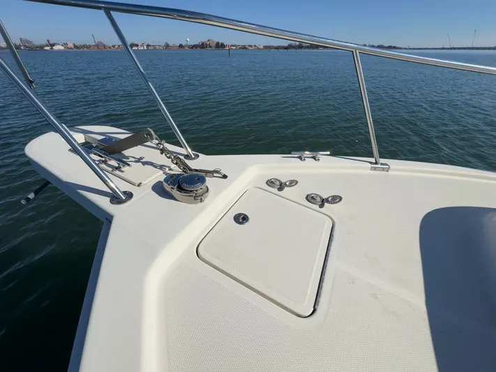 Bay Cruzin Yacht Photos Pics Deck of a 2004 Mainship Pilot 34 boat on calm water.