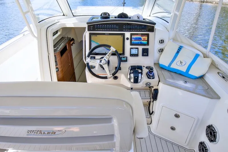 350 Realm Yacht Photos Pics Cockpit of 2019 Boston Whaler 350 Realm with advanced navigation controls.
