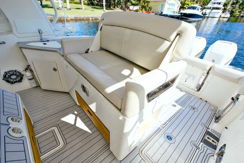 350 Realm Yacht Photos Pics 2019 Boston Whaler 350 Realm interior with seating and deck view.