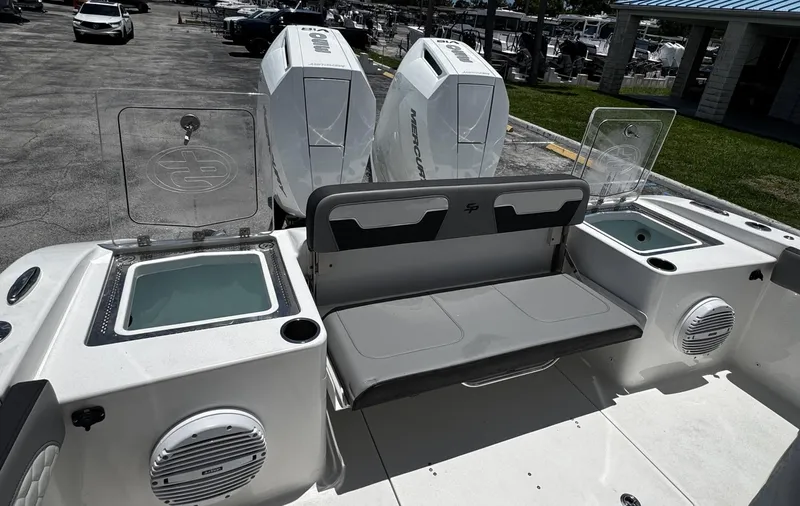  Yacht Photos Pics 2024 Sea Pro 322 DLX boat with dual Mercury engines and seating area.