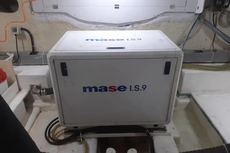  Yacht Photos Pics Mase I.S.9 generator in Mochi Dolphin 51 yacht engine room, 2005 model.