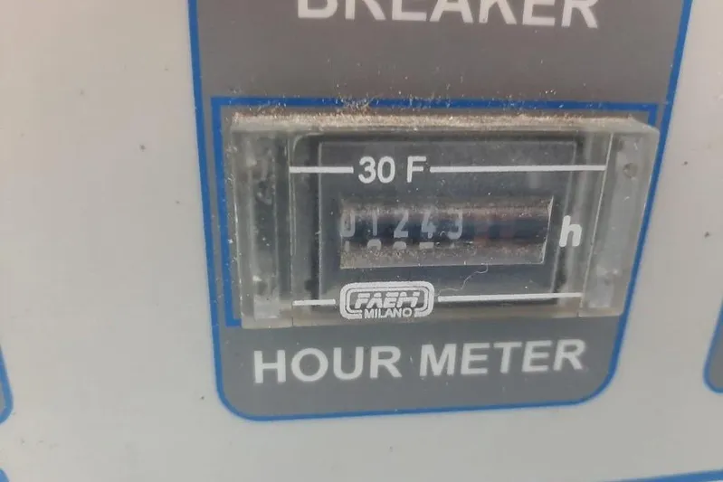  Yacht Photos Pics Hour meter display on Mochi Dolphin 51, 2005 model, showing 1243 hours.