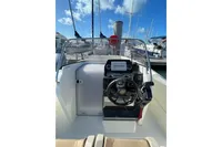 2023 Quicksilver Activ 675 Open boat dashboard with Garmin navigation system.