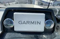 Dashboard of 2023 Quicksilver Activ 675 Open with Garmin navigation system.