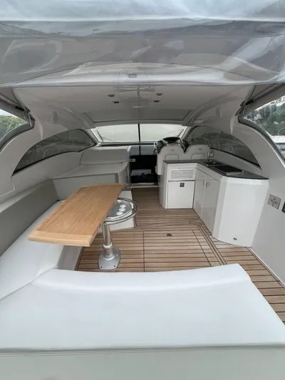 New Sessa C38 Yacht Photos Pics 2024 Sessa Marine C38 yacht interior with sleek design, wooden flooring, and modern amenities.